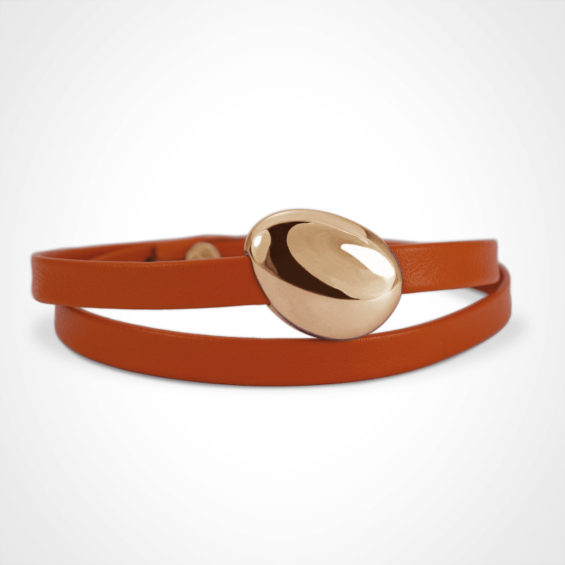 Bracelet galet extra-large Classic LA PLAIA en or rose 750 millièmes sur bracelet cuir orange.